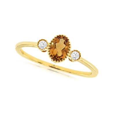 Oval Citrine and Single Diamond Accented Ring