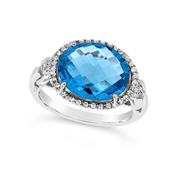 Oval Blue Topaz and Diamond Halo Ring
