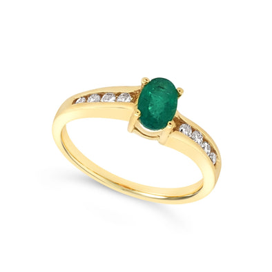 Oval Emerald and Channel Set Diamond Ring