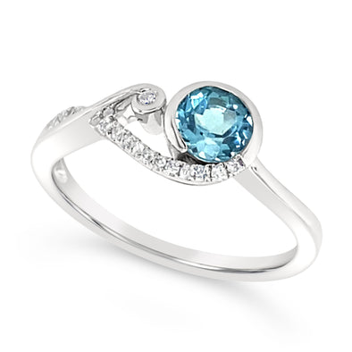 Contemporary Bezel Set Blue Topaz and Diamond Accented Ring